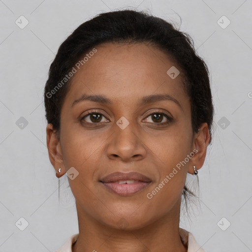 Joyful latino young-adult female with short  brown hair and brown eyes