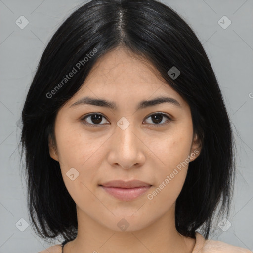 Joyful asian young-adult female with medium  black hair and brown eyes