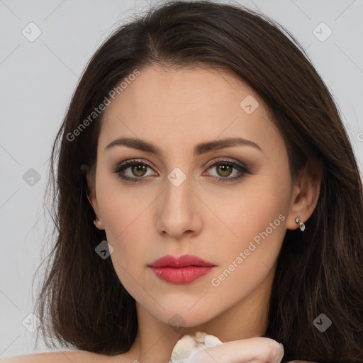 Neutral white young-adult female with long  brown hair and brown eyes