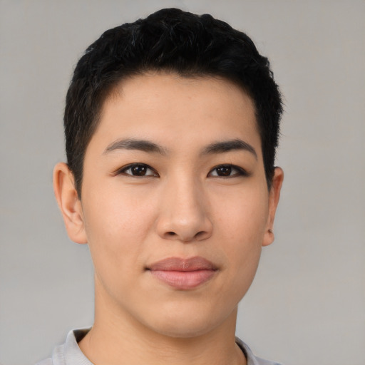 Joyful asian young-adult male with short  black hair and brown eyes