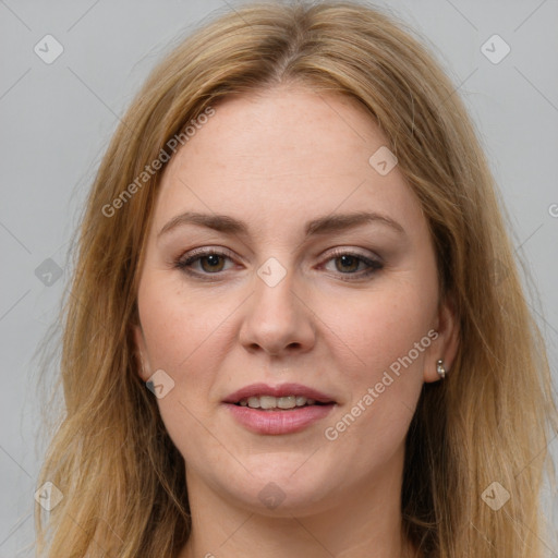 Joyful white young-adult female with long  brown hair and brown eyes