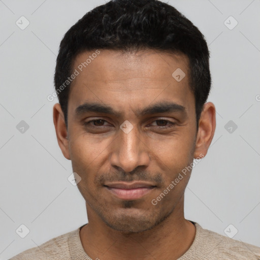 Joyful latino young-adult male with short  black hair and brown eyes