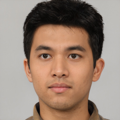 Neutral asian young-adult male with short  black hair and brown eyes