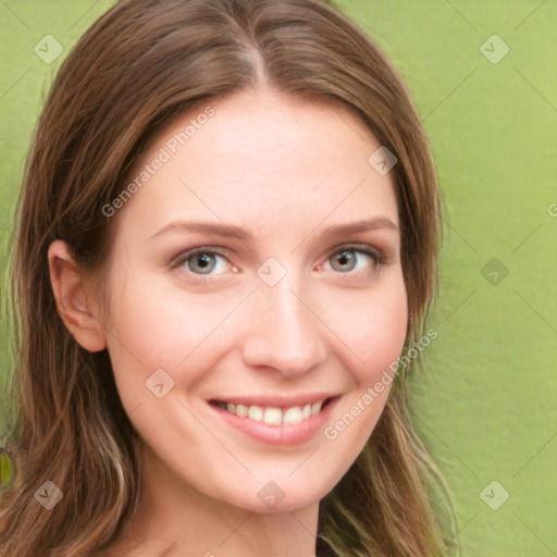 Joyful white young-adult female with long  brown hair and green eyes