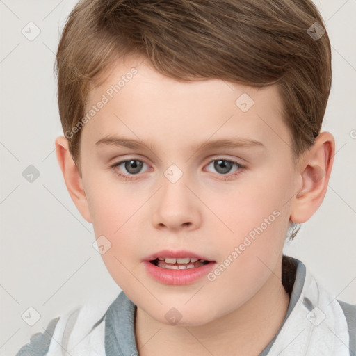 Joyful white child male with short  brown hair and brown eyes