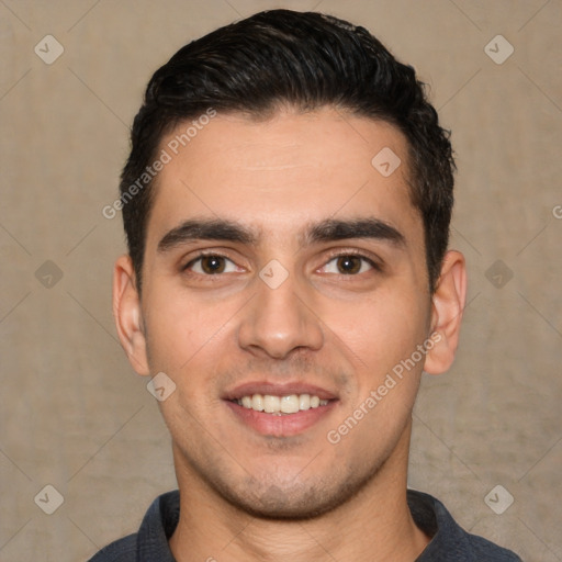 Joyful white young-adult male with short  black hair and brown eyes