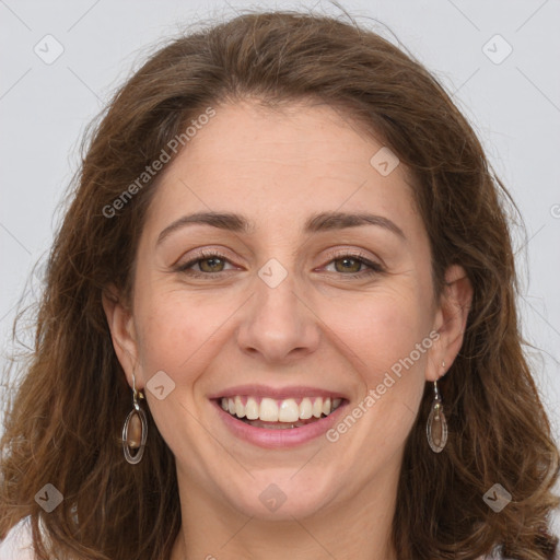 Joyful white young-adult female with long  brown hair and green eyes