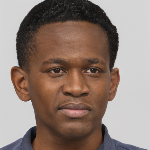 Neutral black young-adult male with short  brown hair and brown eyes