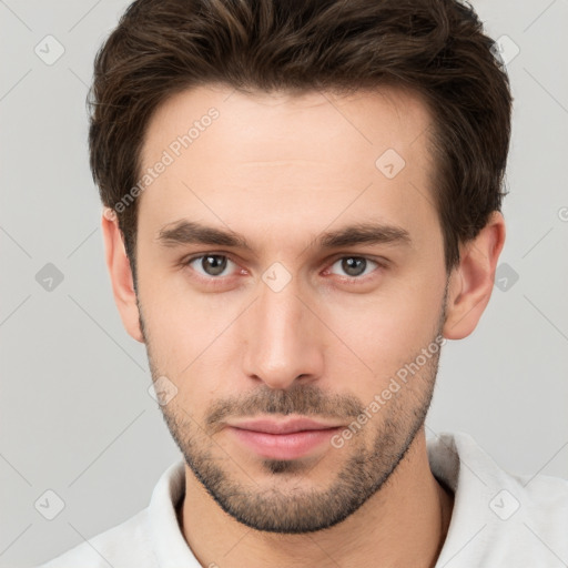 Neutral white young-adult male with short  brown hair and brown eyes