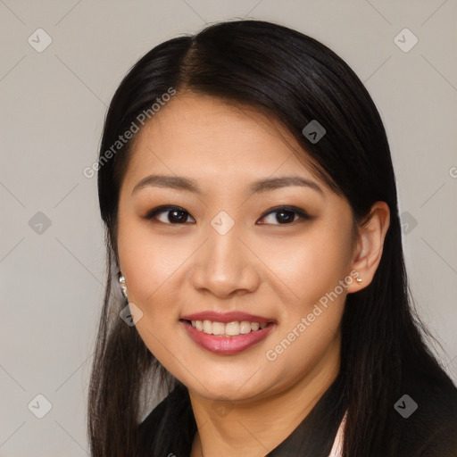Joyful asian young-adult female with long  black hair and brown eyes