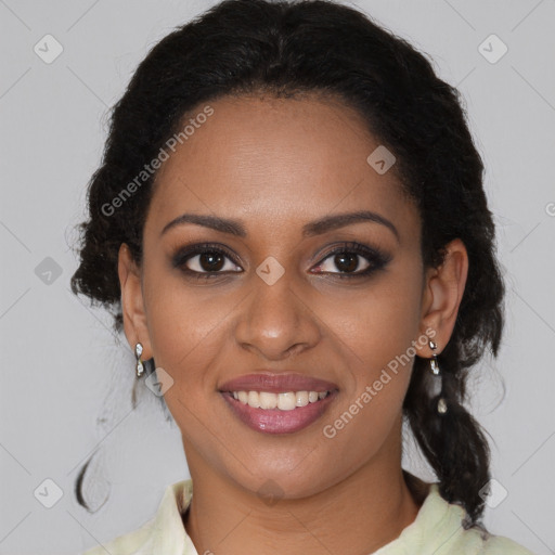 Joyful black young-adult female with medium  brown hair and brown eyes