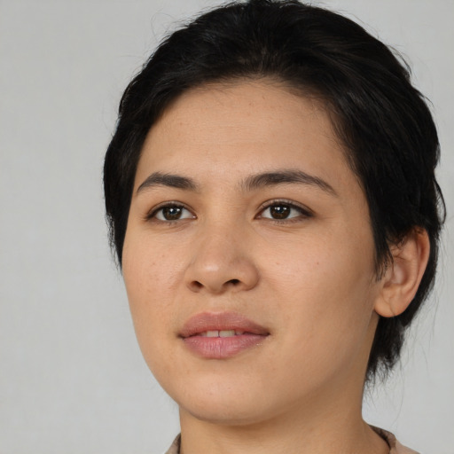 Joyful asian young-adult female with medium  black hair and brown eyes