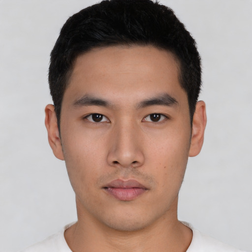 Neutral asian young-adult male with short  black hair and brown eyes