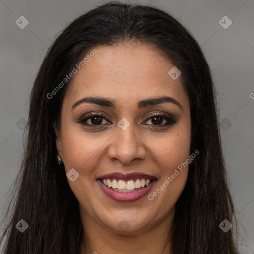 Joyful latino young-adult female with long  brown hair and brown eyes