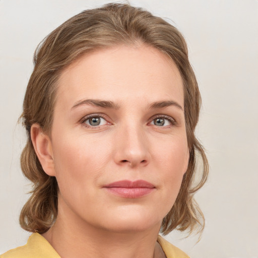 Neutral white young-adult female with medium  brown hair and grey eyes