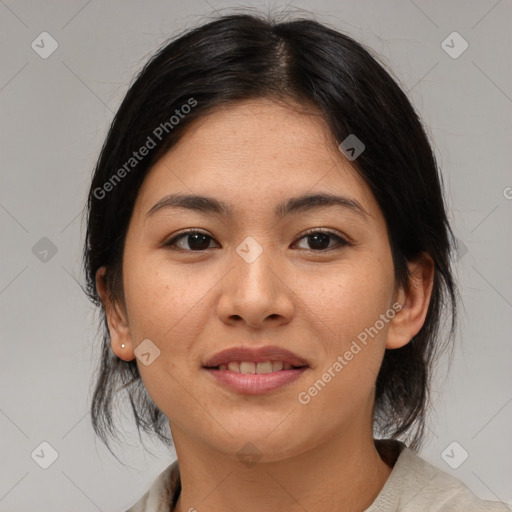 Joyful asian young-adult female with medium  brown hair and brown eyes