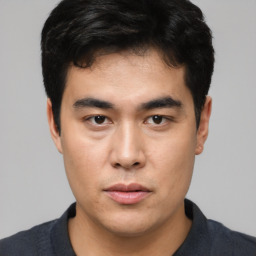 Neutral asian young-adult male with short  black hair and brown eyes