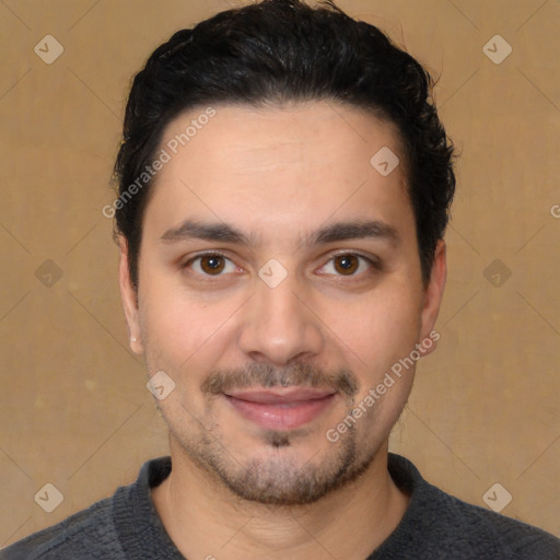 Joyful white young-adult male with short  black hair and brown eyes