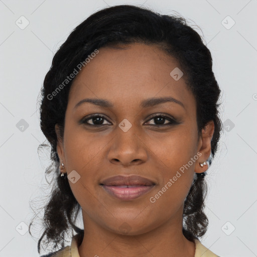 Joyful black young-adult female with medium  brown hair and brown eyes