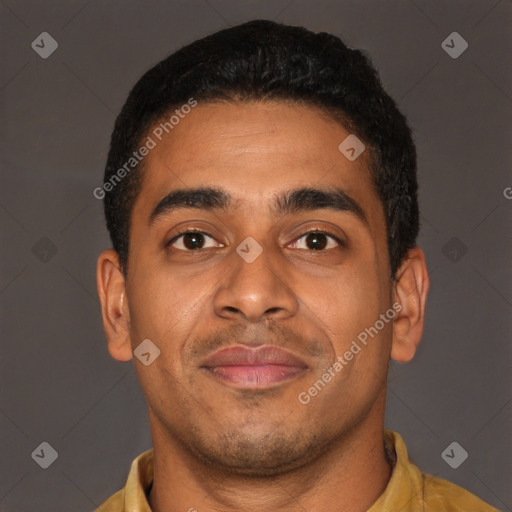Joyful latino young-adult male with short  brown hair and brown eyes