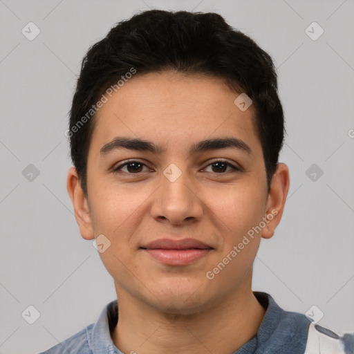 Joyful latino young-adult male with short  black hair and brown eyes