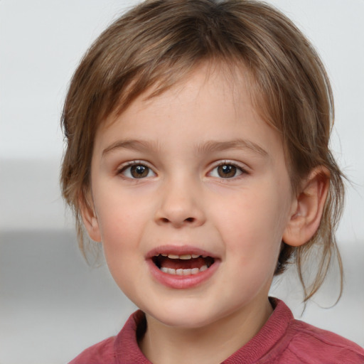 Joyful white child female with medium  brown hair and brown eyes