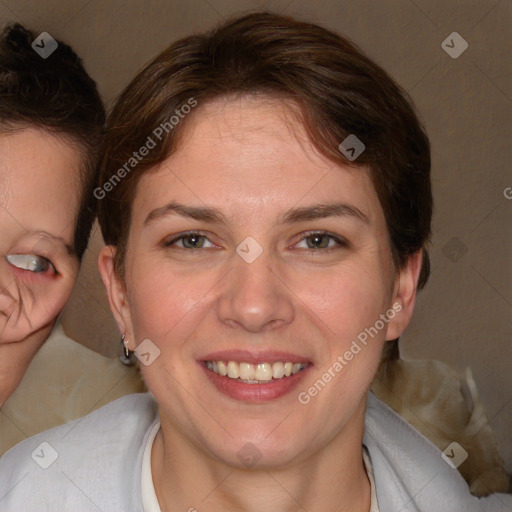 Joyful white young-adult female with medium  brown hair and brown eyes