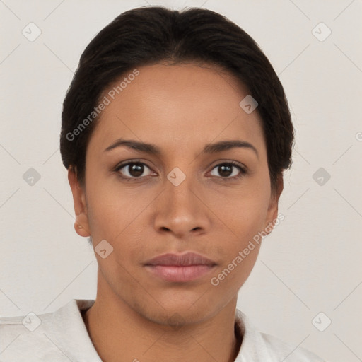 Neutral white young-adult female with short  brown hair and brown eyes