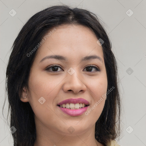 Joyful latino young-adult female with long  brown hair and brown eyes