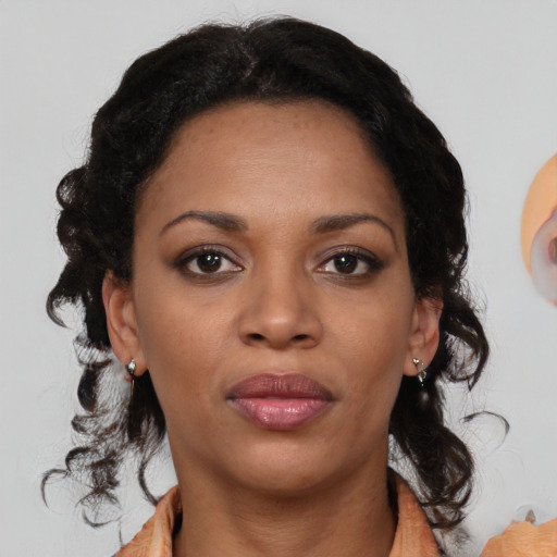 Neutral black young-adult female with medium  black hair and brown eyes