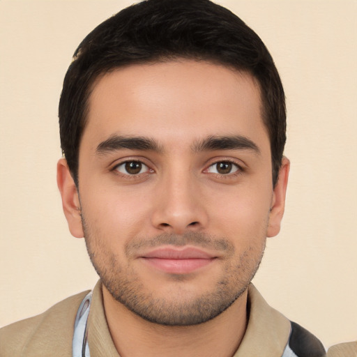 Joyful white young-adult male with short  brown hair and brown eyes