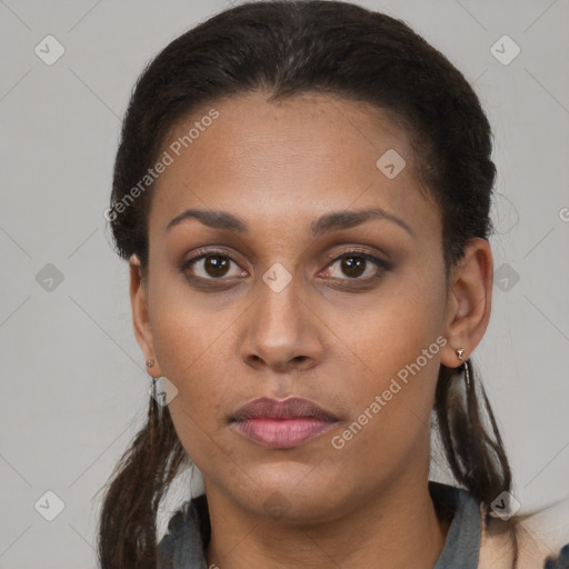 Neutral black young-adult female with long  brown hair and brown eyes