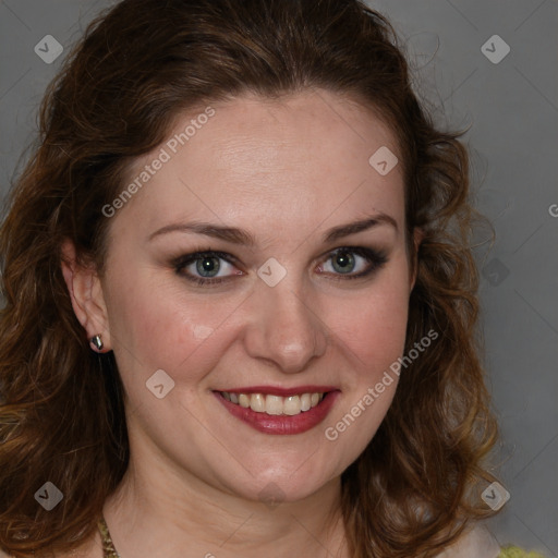 Joyful white young-adult female with medium  brown hair and green eyes