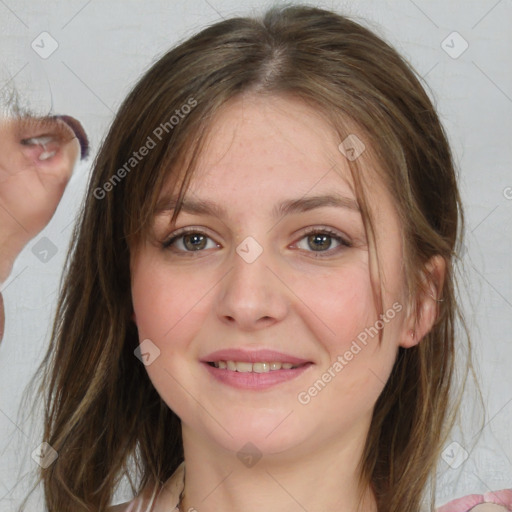 Joyful white young-adult female with medium  brown hair and blue eyes