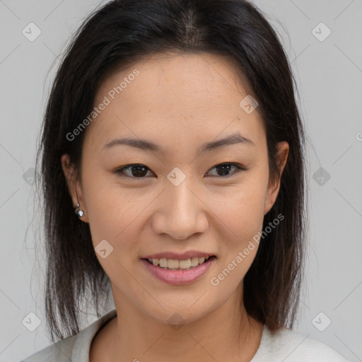 Joyful asian young-adult female with medium  brown hair and brown eyes