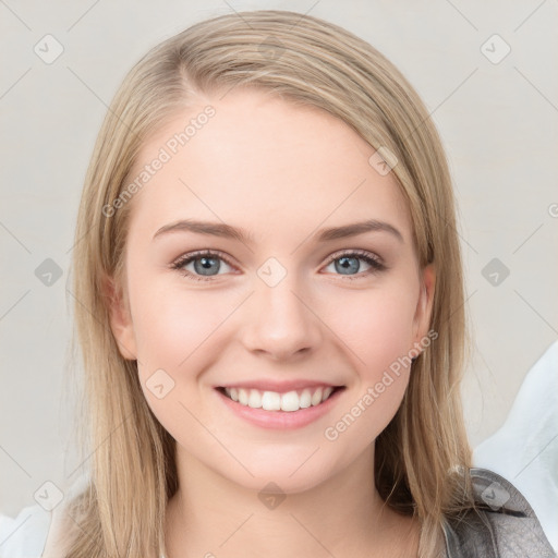 Joyful white young-adult female with long  brown hair and blue eyes