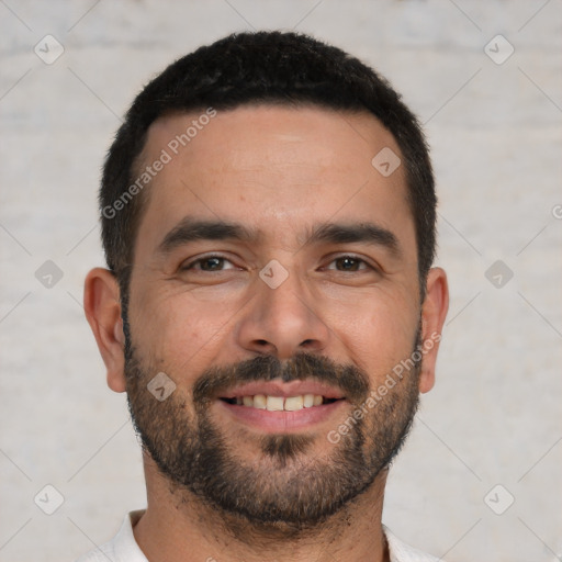 Joyful white young-adult male with short  black hair and brown eyes