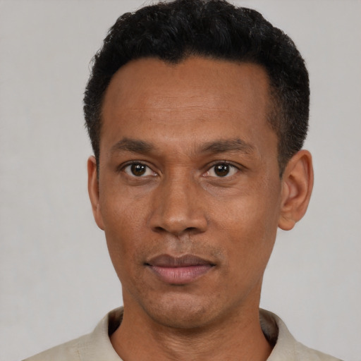 Neutral latino adult male with short  black hair and brown eyes