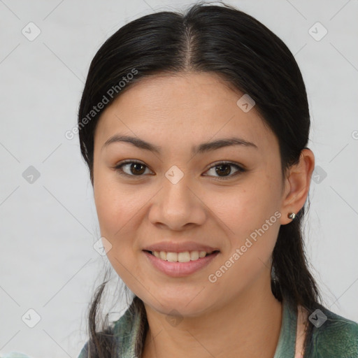 Joyful asian young-adult female with medium  brown hair and brown eyes