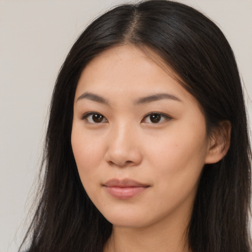 Neutral asian young-adult female with long  brown hair and brown eyes