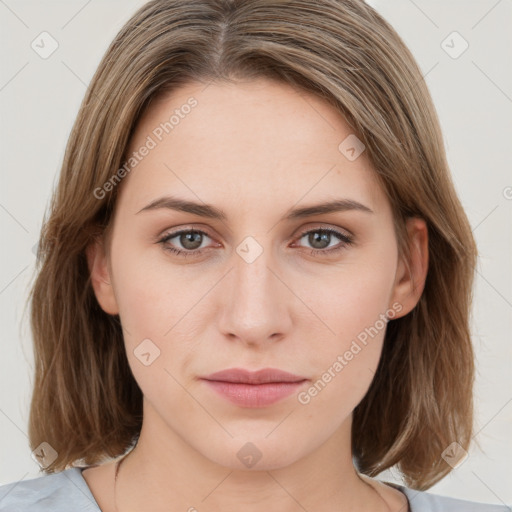 Neutral white young-adult female with medium  brown hair and green eyes