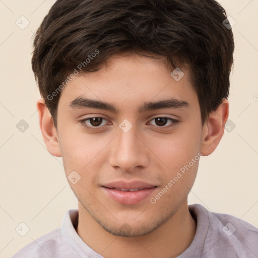 Joyful white child male with short  brown hair and brown eyes