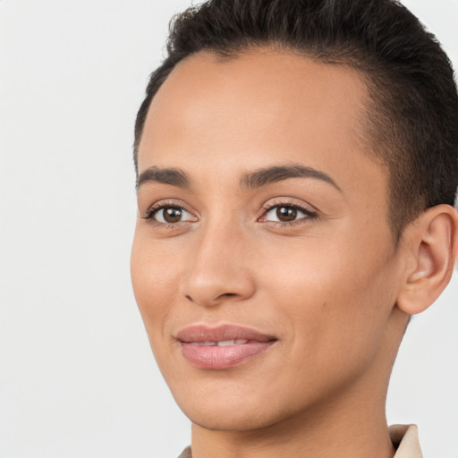 Joyful white young-adult female with short  brown hair and brown eyes