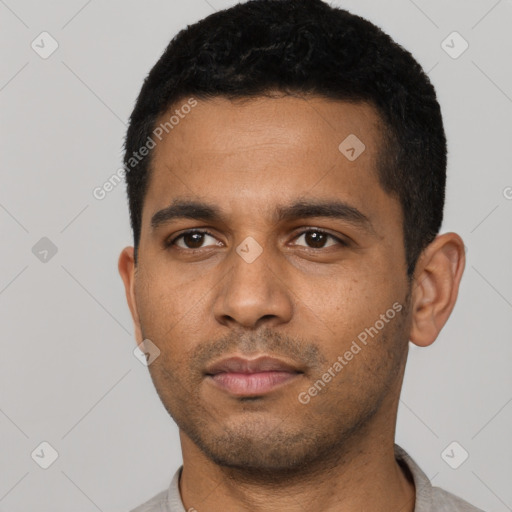 Neutral latino young-adult male with short  black hair and brown eyes