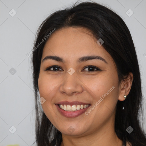 Joyful white young-adult female with long  brown hair and brown eyes