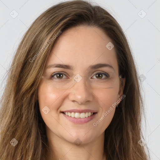 Joyful white young-adult female with long  brown hair and green eyes