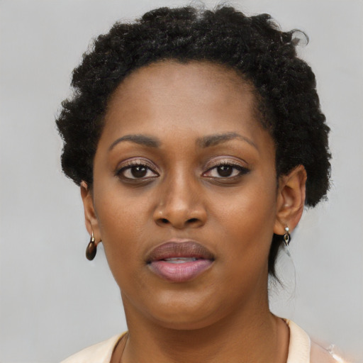 Neutral black young-adult female with short  brown hair and brown eyes