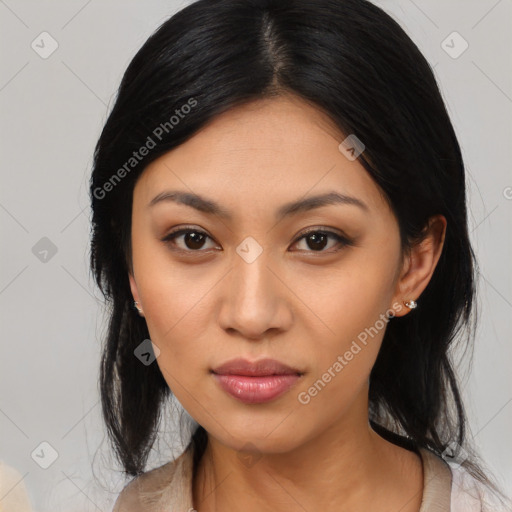 Joyful latino young-adult female with medium  black hair and brown eyes