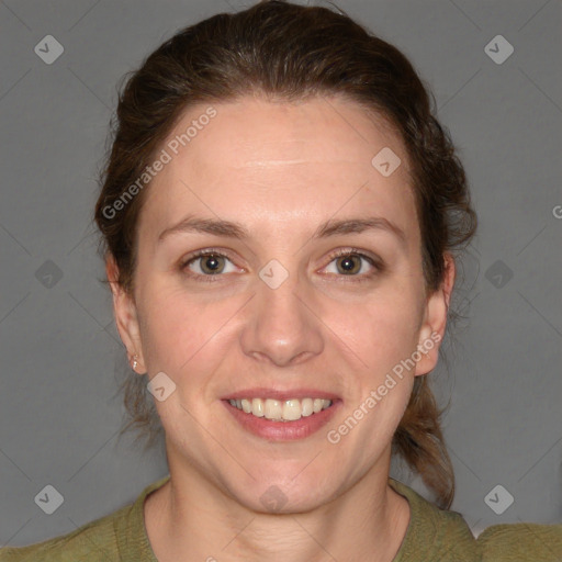 Joyful white young-adult female with medium  brown hair and blue eyes