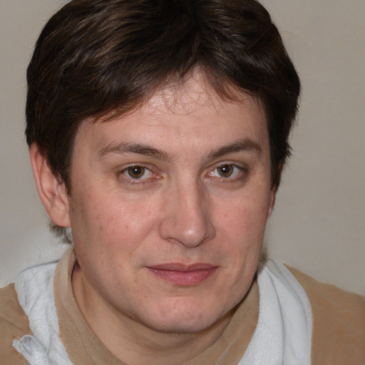 Joyful white young-adult male with medium  brown hair and brown eyes